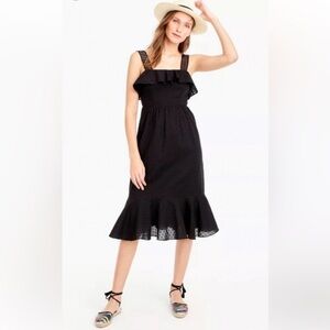 Black cotton midi dress with ruffled top and bottom